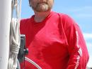 Steve KA1RCI at the helm of sailing vessel Bellerophon while underway